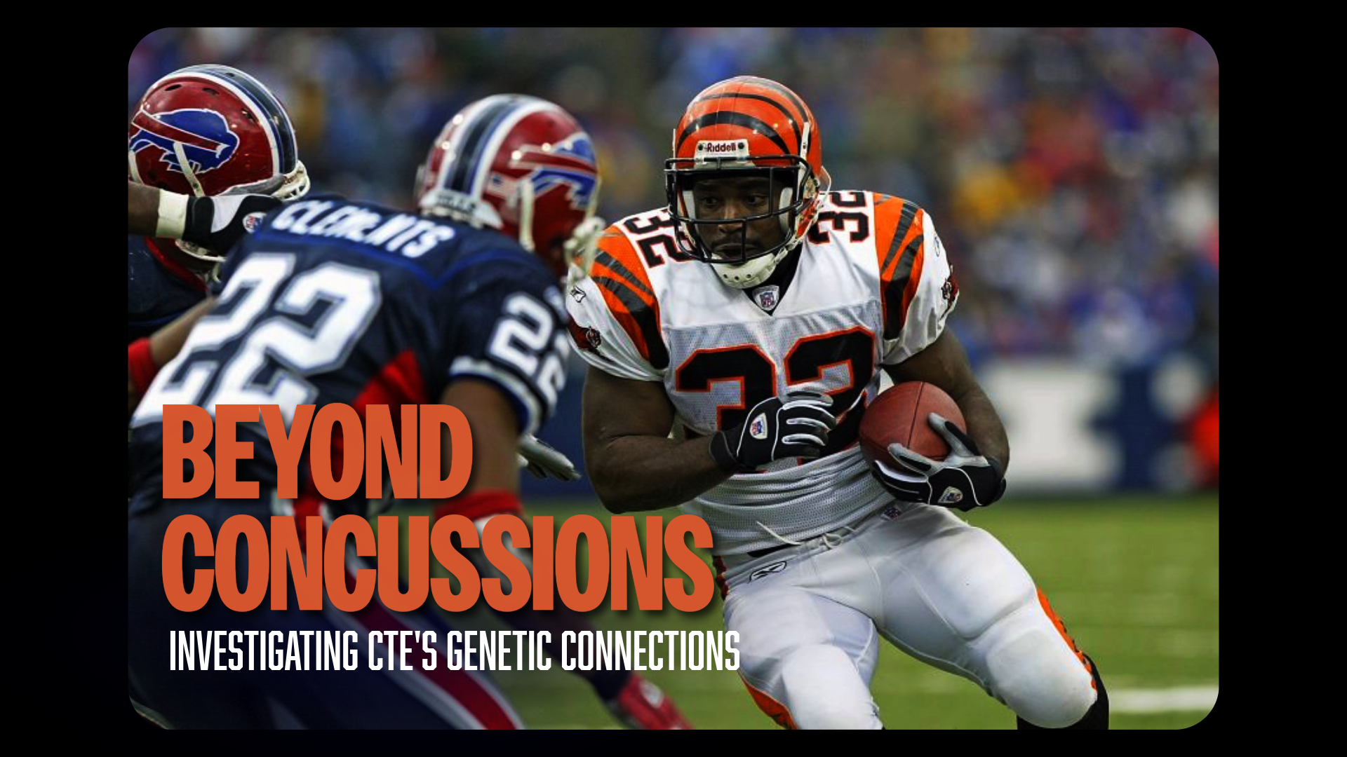 Football player Rudi Johnson holding ball while players from opposing side attempt to tackle